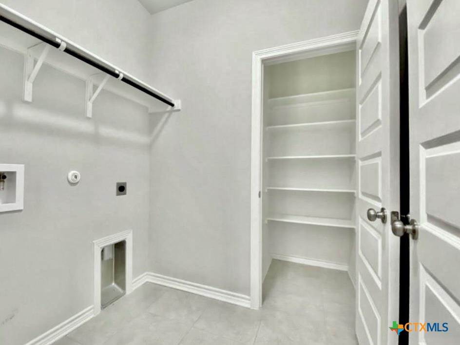 816 Alta Way Leander, TX 78641 - Photo 20 of 37 a view of a walk in closet
