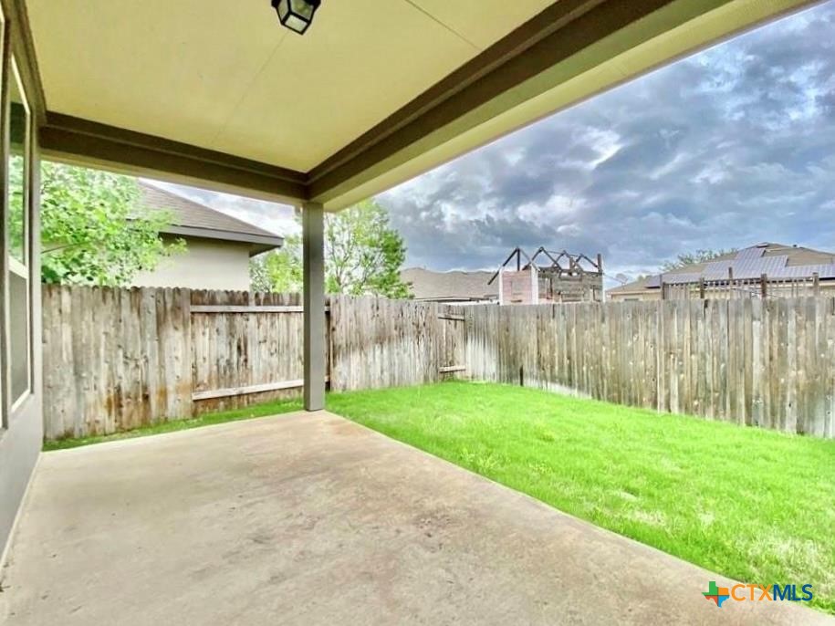 816 Alta Way Leander, TX 78641 - Photo 35 of 37 a view of a backyard with a garden