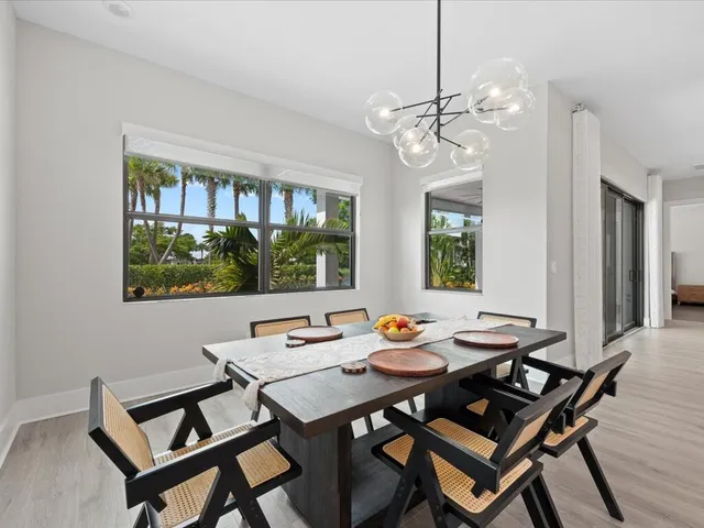 a bedroom with a bed and a large mirror