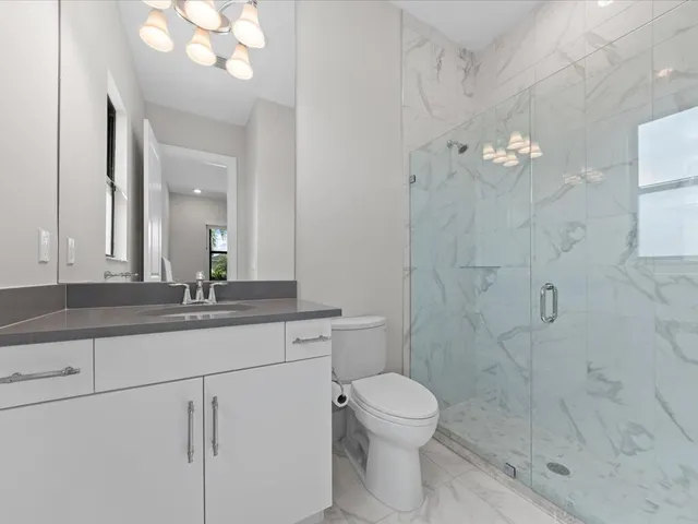 a aerial view of a house with garden