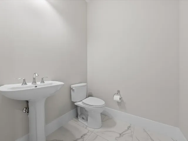 a room with furniture and a flat screen tv