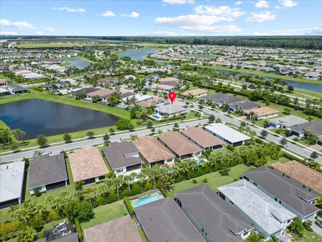 an aerial view of a house with outdoor space