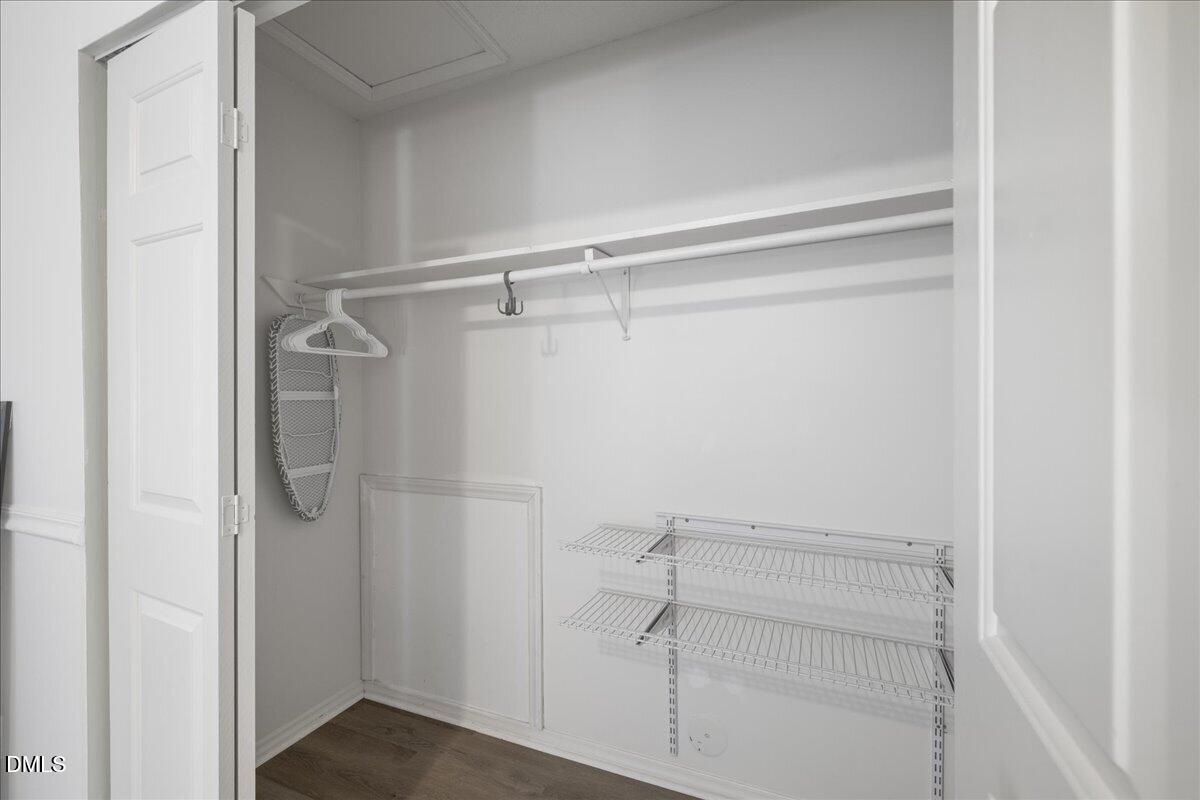 4 Astor Court Durham, NC 27705 - Photo 22 of 29 a view of walk in closet with empty racks