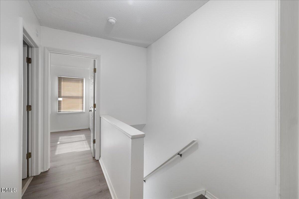 4 Astor Court Durham, NC 27705 - Photo 23 of 29 a view of hallway with stairs