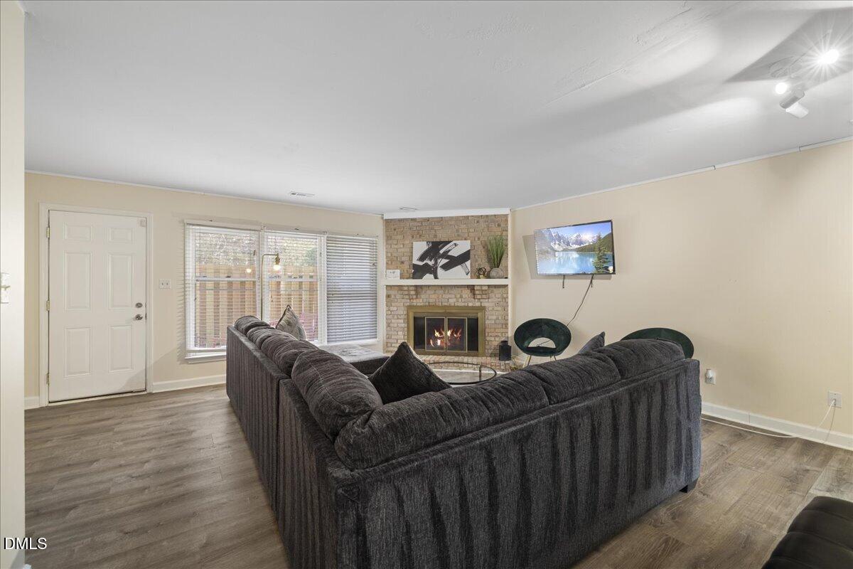 4 Astor Court Durham, NC 27705 - Photo 9 of 29 a living room with furniture and a window