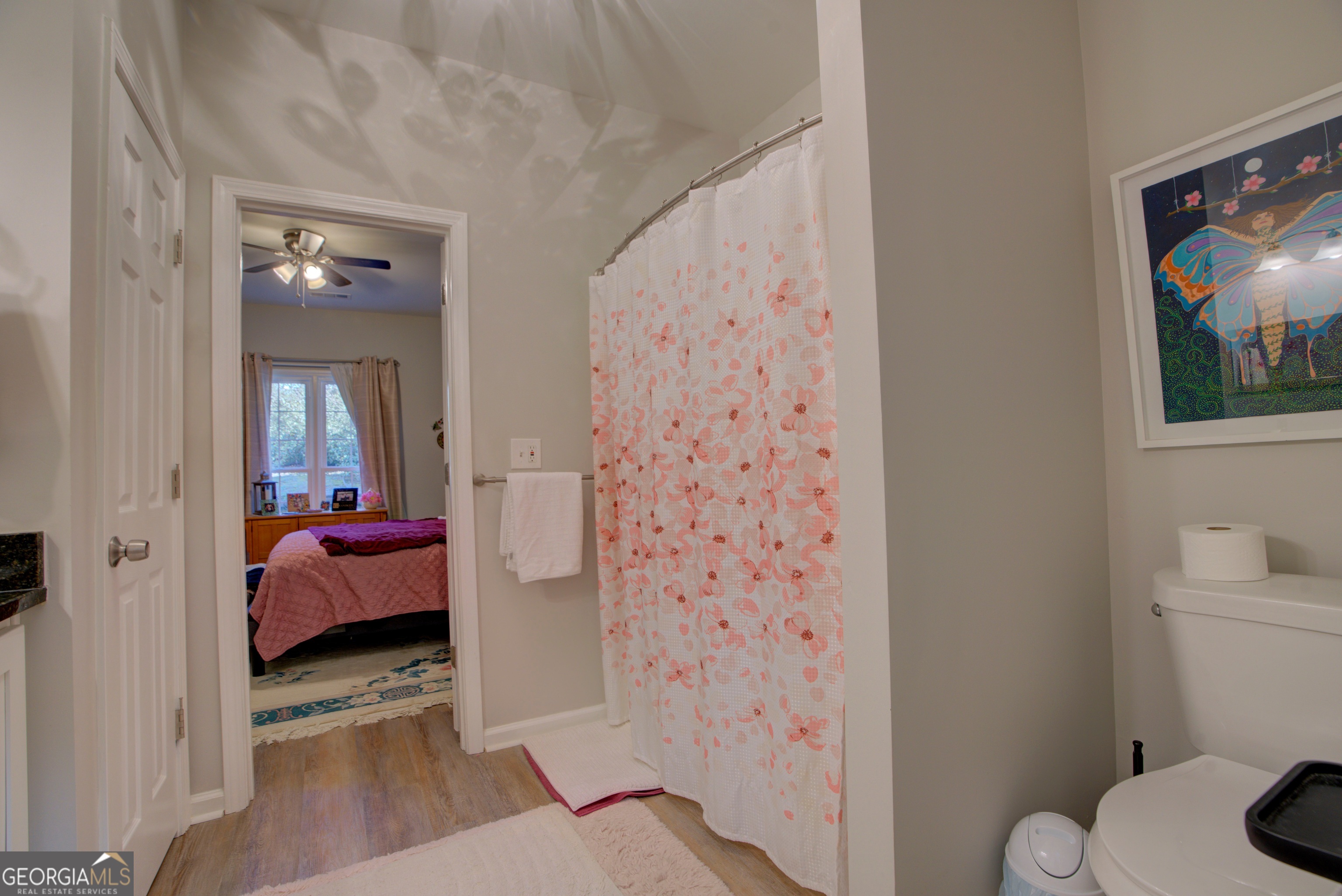 814 Manor Way Cartersville, GA 30120 - Photo 15 of 24 a en suite bathroom with a toilet sink and mirror