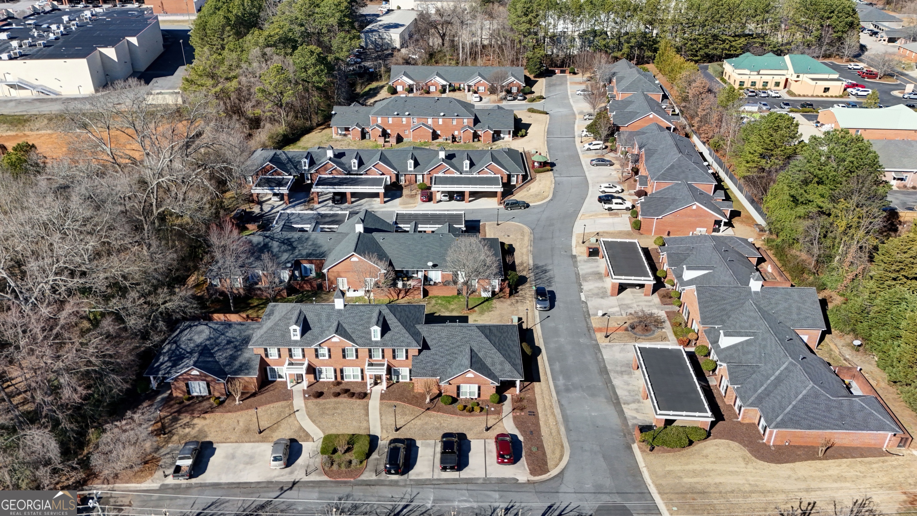814 Manor Way Cartersville, GA 30120 - Photo 2 of 24 a view of building along with trees