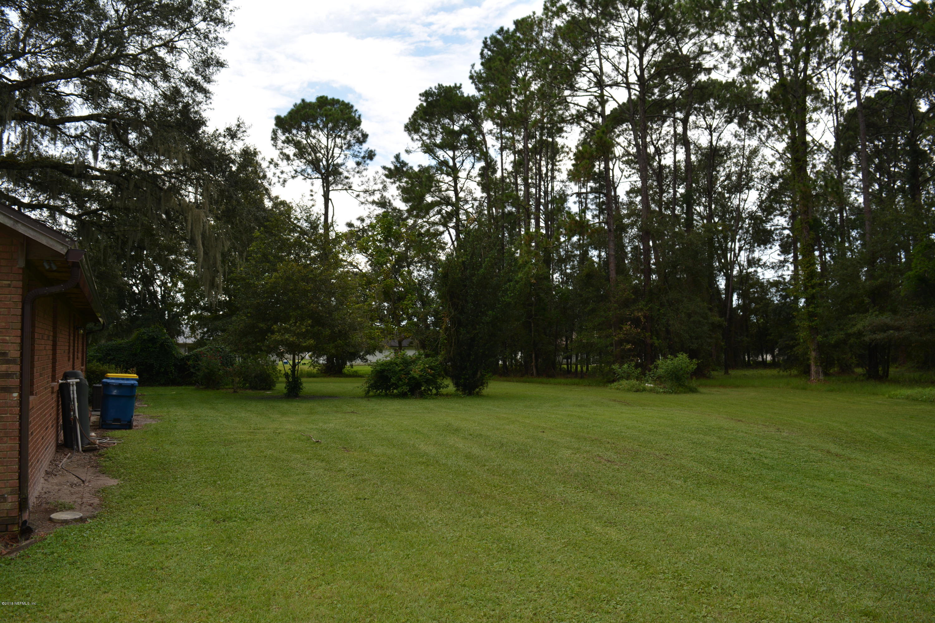 11534 Braddock Road Jacksonville, FL 32219 - Photo 54 of 68 a view of a trees in a park