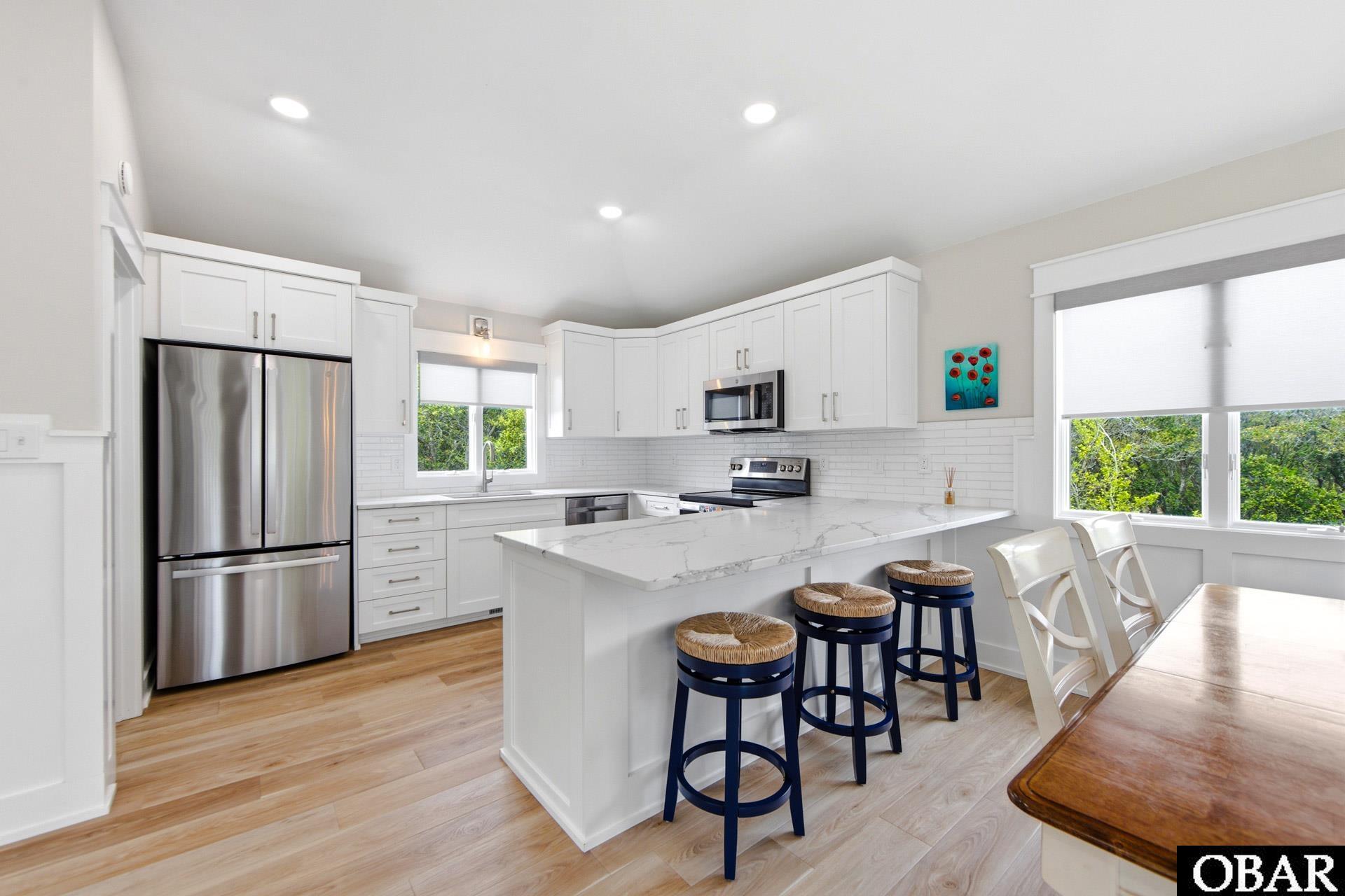 318 Duck Road Southern Shores, NC 27949 - Photo 4 of 28 Quartz Counters and Stainless Appliances