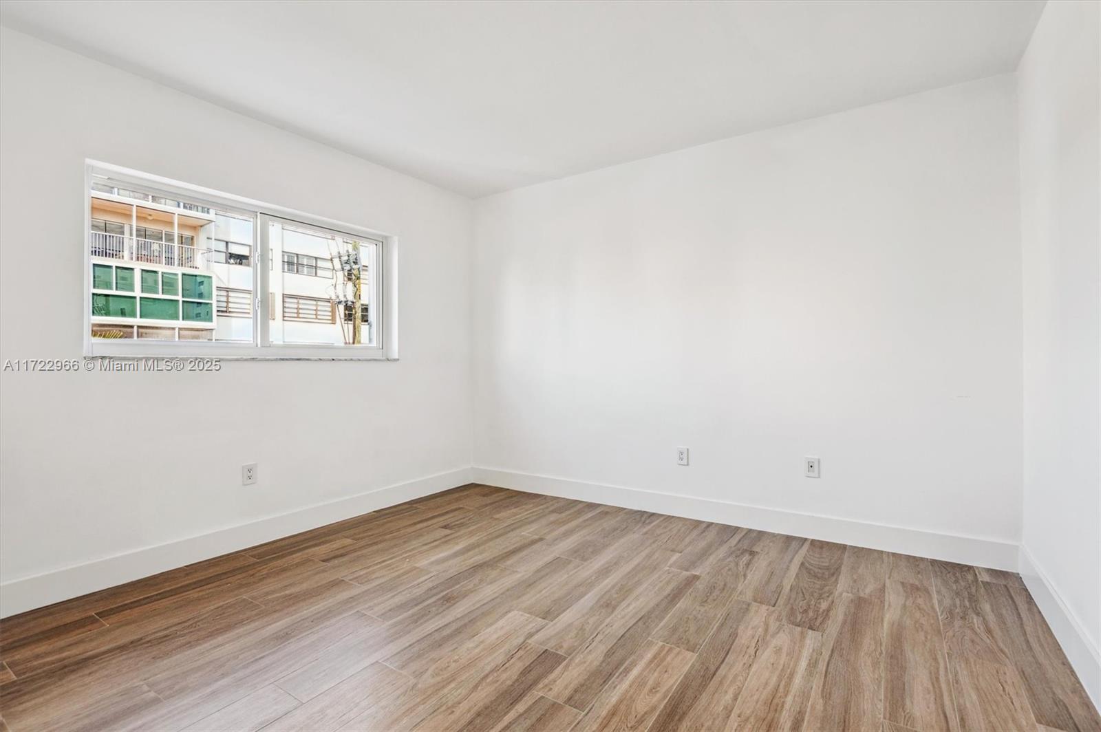 301 Sunrise Drive, Unit 3AW Key Biscayne, FL 33149 - Photo 18 of 23 an empty room with a window