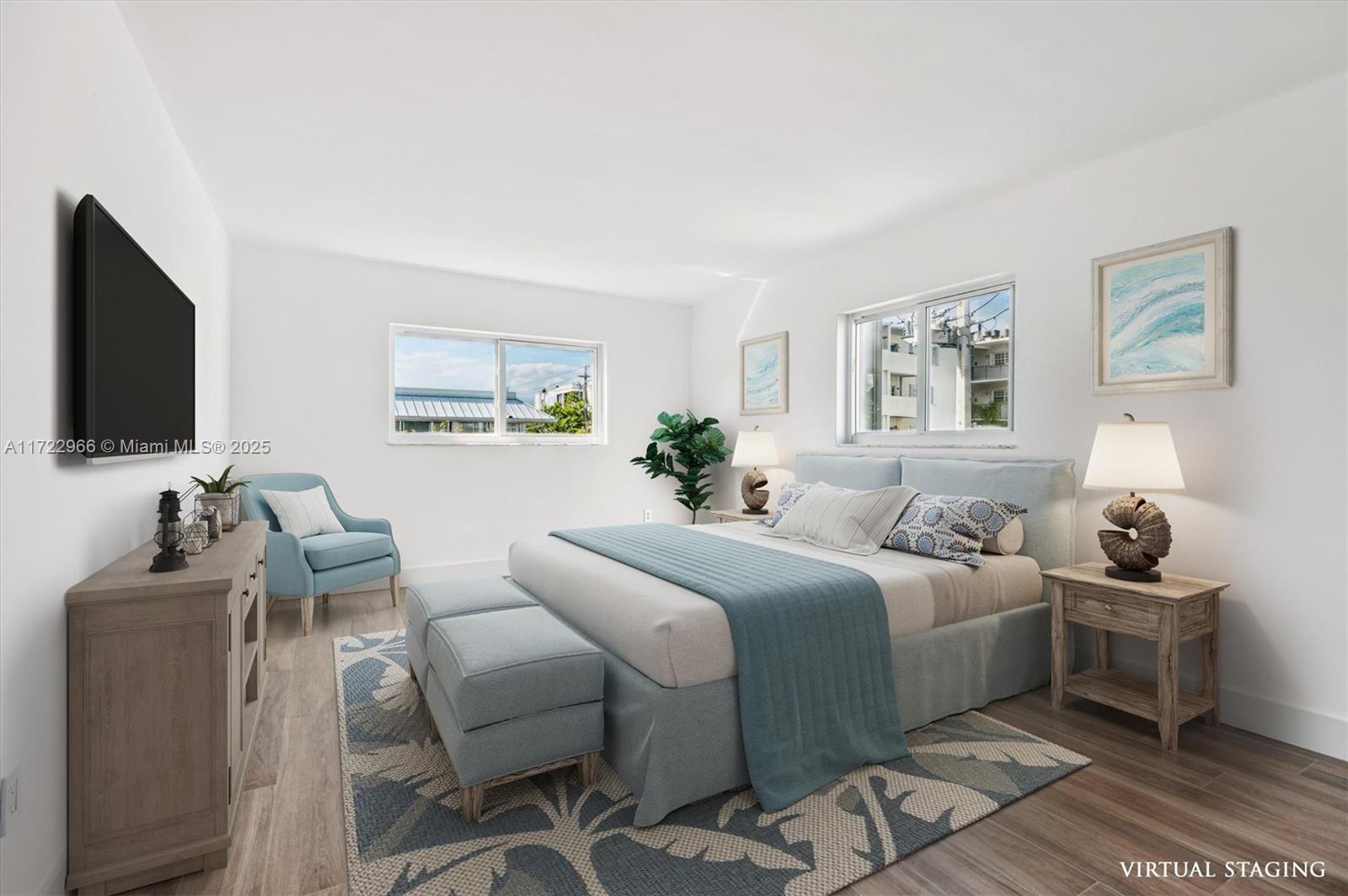 301 Sunrise Drive, Unit 3AW Key Biscayne, FL 33149 - Photo 7 of 23 a bedroom with a bed and a flat screen tv