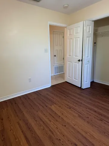 a view of a kitchen with furniture and window