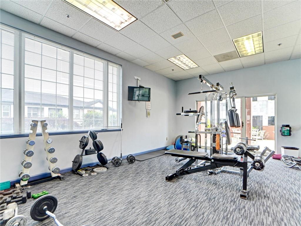 3435 Kingsboro Road Northeast, Unit 1601 Atlanta, GA 30326 - Photo 47 of 54 a view of a room with gym equipment