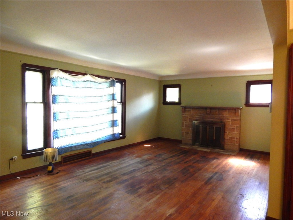 6990 Broadview Road Cleveland, OH 44134 - Photo 6 of 36 Bring your ideas to enhance the vintage charm of this generous sized Living Room with Stone front Fireplace.