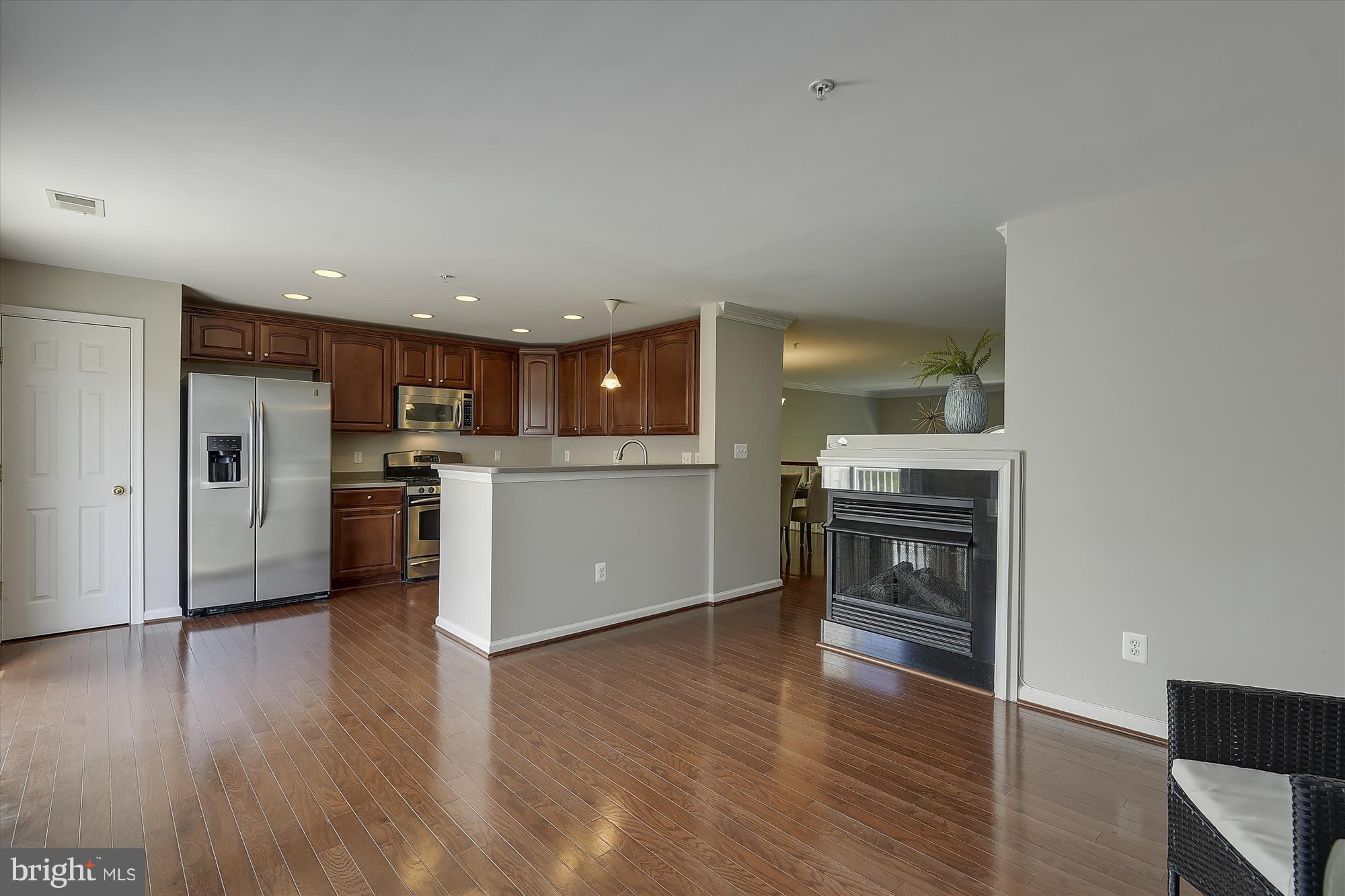 12460 Liberty Bridge Road, Unit 106B Fairfax, VA 22033 - Photo 14 of 30 Kitchen w/SS appliances, gas cooking & pantry