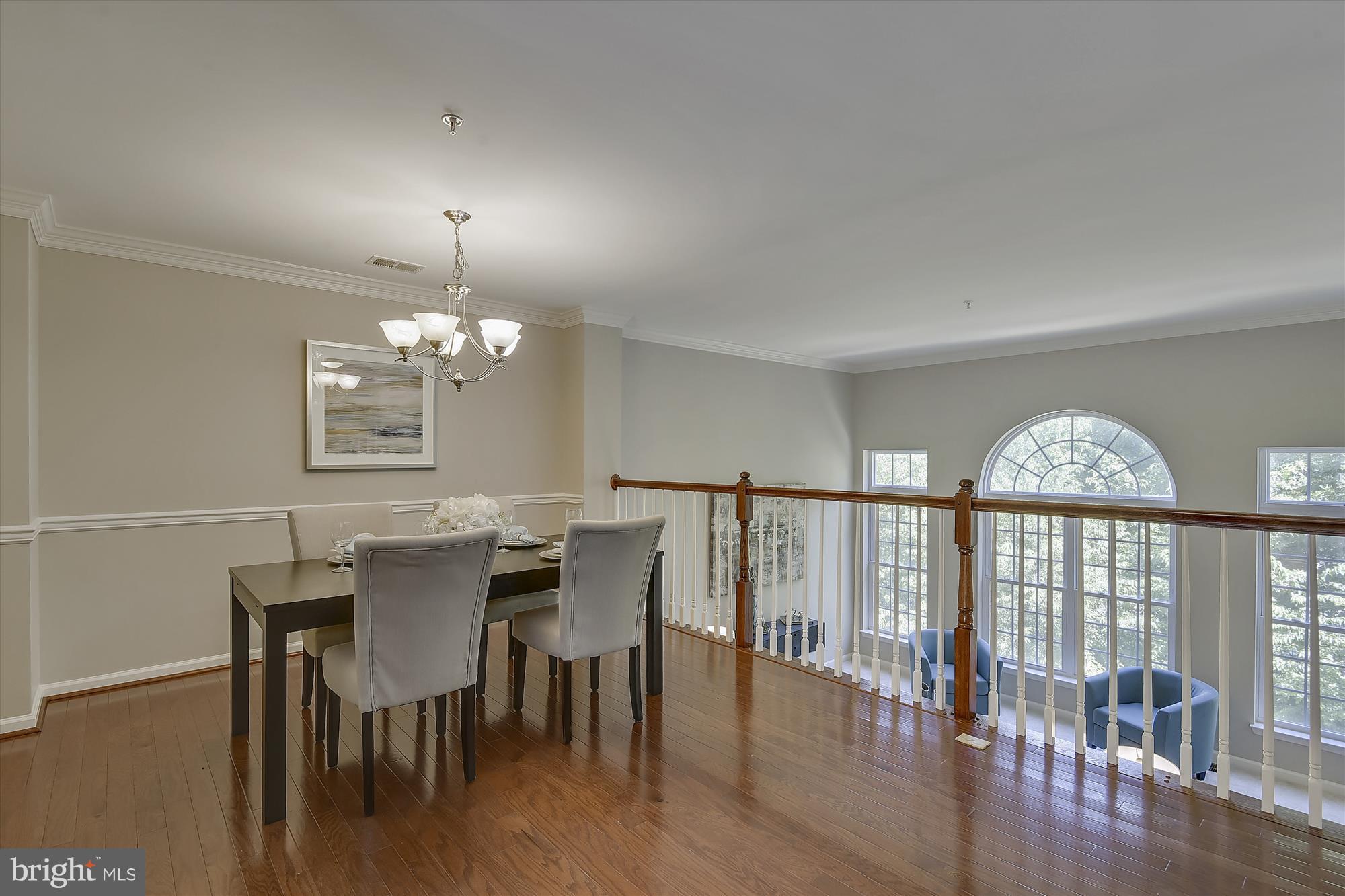12460 Liberty Bridge Road, Unit 106B Fairfax, VA 22033 - Photo 8 of 30 Dining Room w/HW floors, chair rail and crown mold