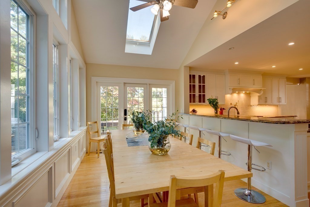 63 Brook Street Wellesley, MA 02482 - Photo 11 of 41 a view of a dining room with furniture wooden floor and a chandelier