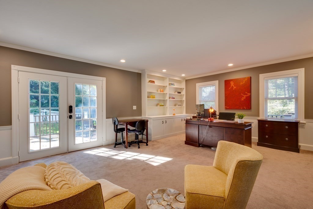 63 Brook Street Wellesley, MA 02482 - Photo 20 of 41 a living room with furniture and a window