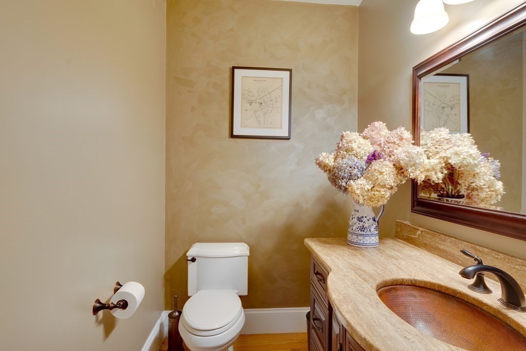 63 Brook Street Wellesley, MA 02482 - Photo 21 of 41 a bathroom with a sink mirror and toilet