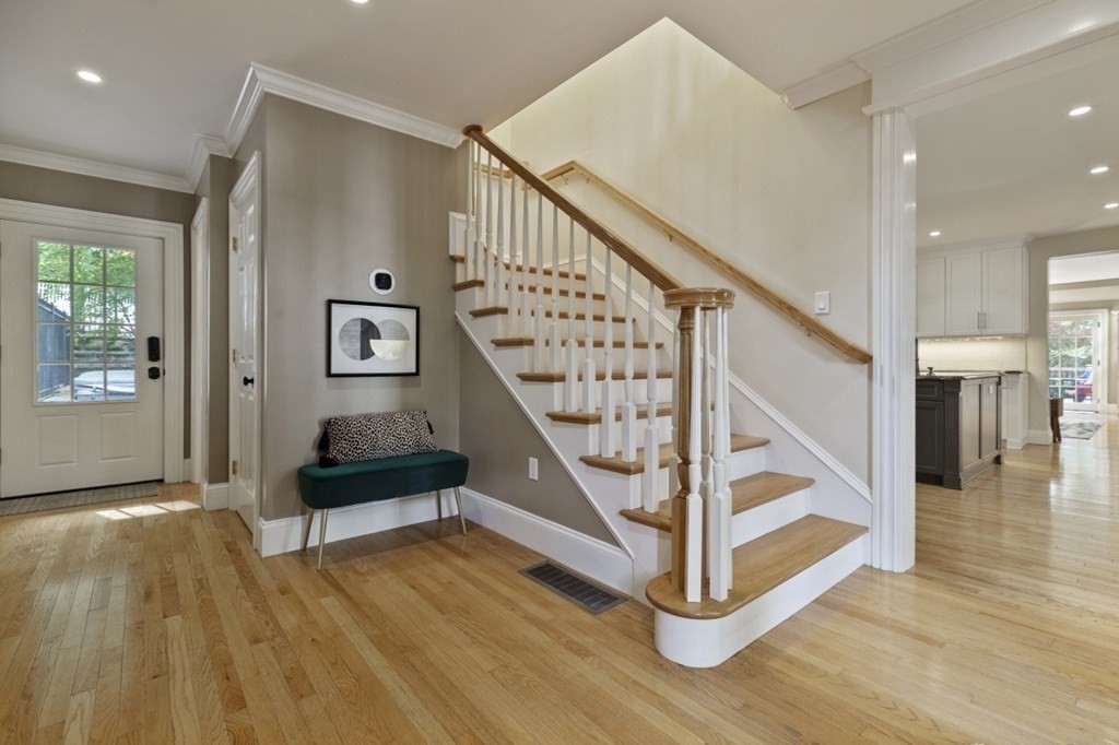 63 Brook Street Wellesley, MA 02482 - Photo 22 of 41 a view of entryway and hall with wooden floor