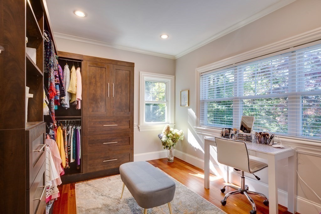 63 Brook Street Wellesley, MA 02482 - Photo 25 of 41 a living room with furniture and a window