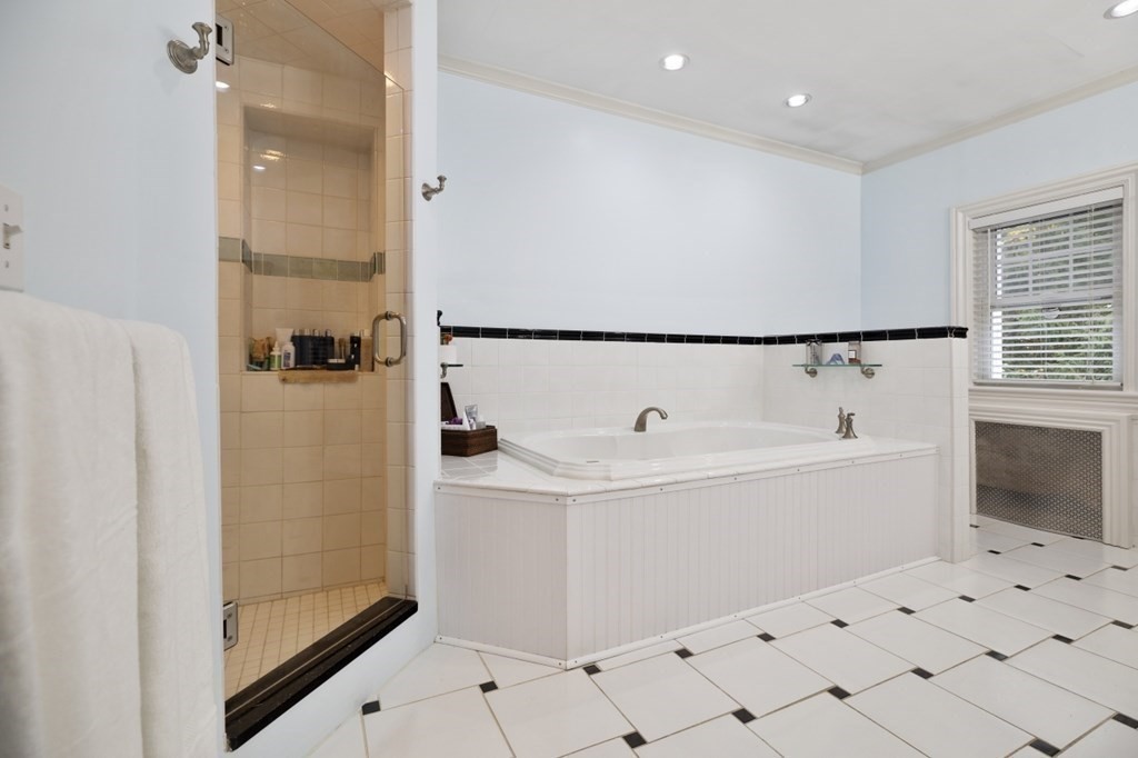 63 Brook Street Wellesley, MA 02482 - Photo 27 of 41 a view of bathroom with bathtub and shower