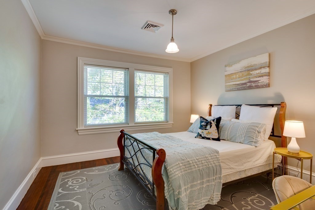 63 Brook Street Wellesley, MA 02482 - Photo 30 of 41 a bedroom with bed and a window