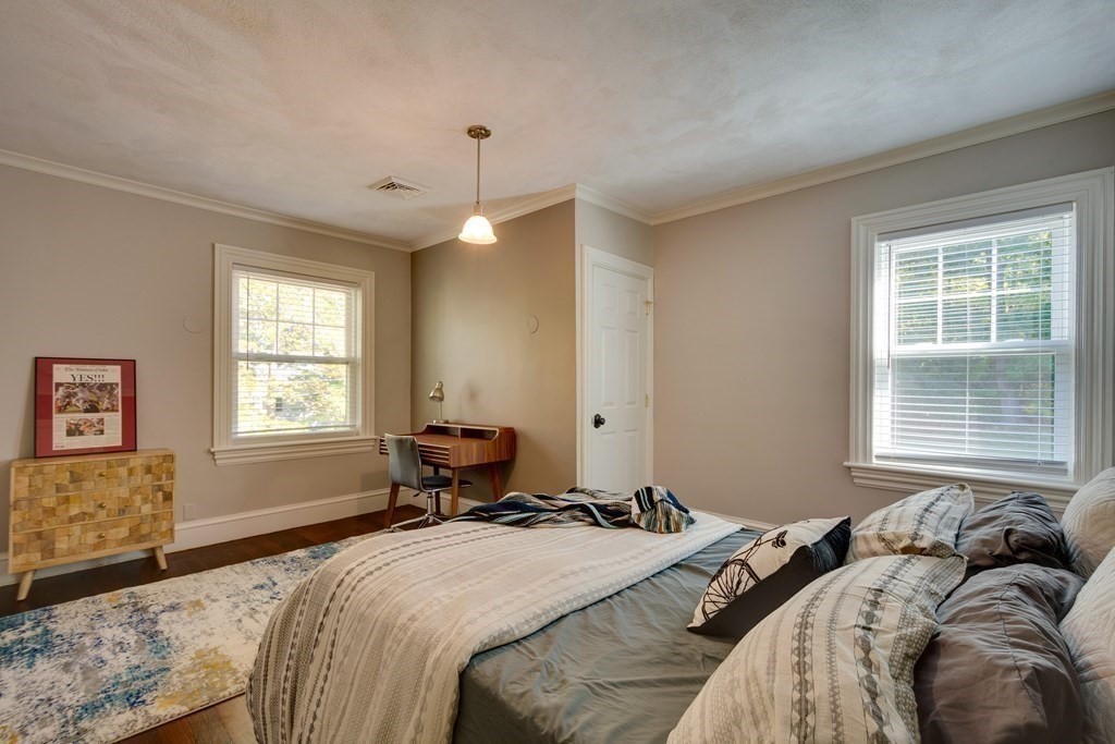 63 Brook Street Wellesley, MA 02482 - Photo 31 of 41 a bedroom with a bed and a window