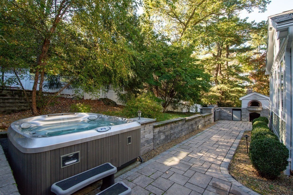 63 Brook Street Wellesley, MA 02482 - Photo 37 of 41 a view of a backyard with sitting area