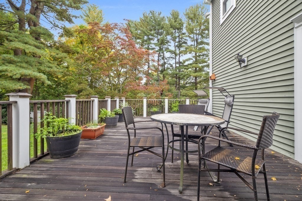 63 Brook Street Wellesley, MA 02482 - Photo 39 of 41 a view of a table and chairs in the patio