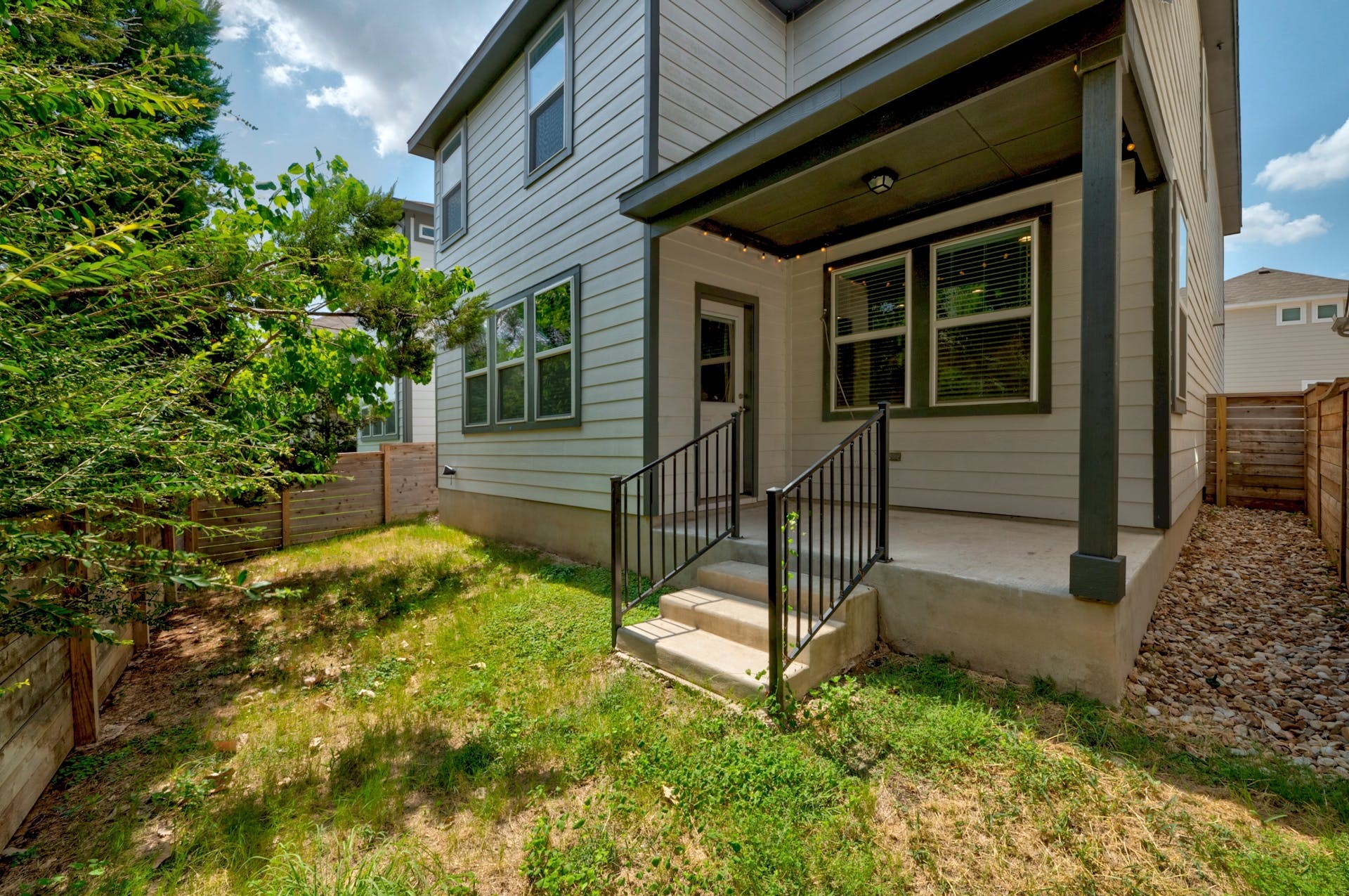 5107 Lemon Tree Path, Unit 127 Austin, TX 78723 - Photo 33 of 40 a view of a house with a yard