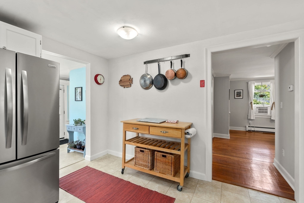 10 Prospect Street Maynard, MA 01754 - Photo 13 of 34 a living room with furniture and a fireplace