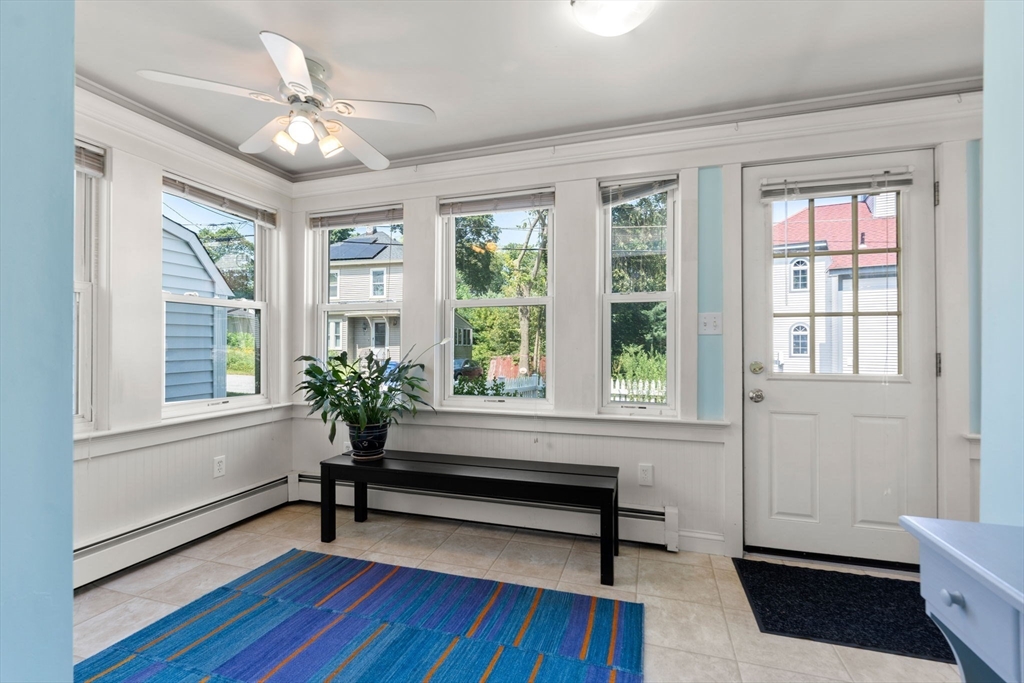 10 Prospect Street Maynard, MA 01754 - Photo 3 of 34 a living room with furniture and a window