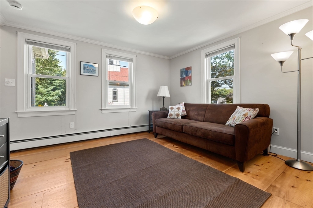 10 Prospect Street Maynard, MA 01754 - Photo 7 of 34 a living room with furniture and a window