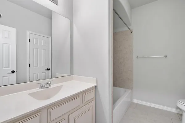 a bathroom with a bathtub