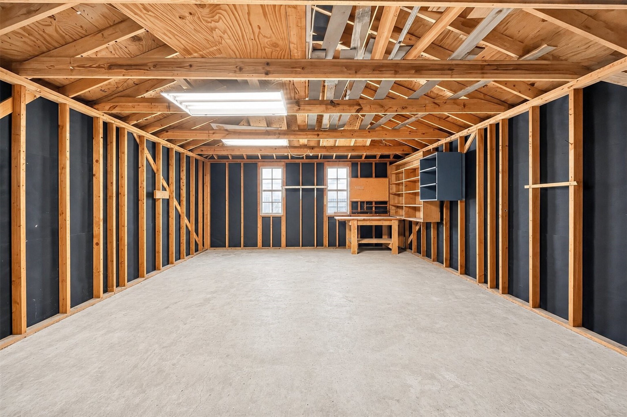 6507 Spring Leaf Drive Spring, TX 77379 - Photo 43 of 50 Enhaned picture of the third car carge with built in workspce.