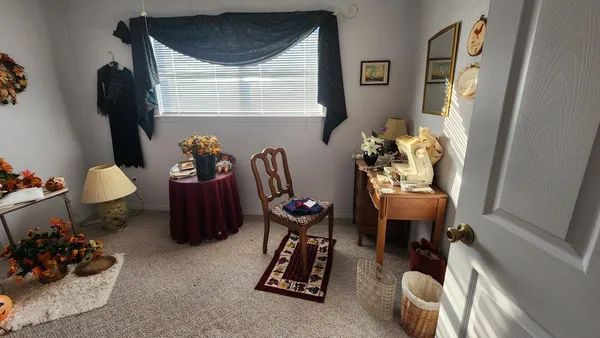 a living room with furniture and a table