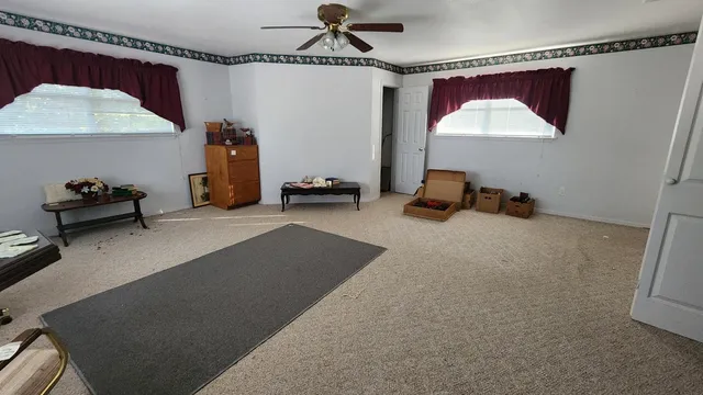 a room with gym equipment and a mirror