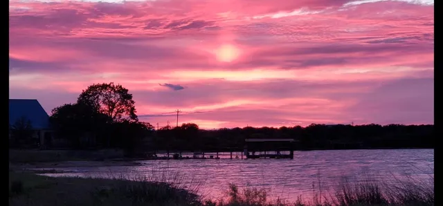 a view of outside with sunset