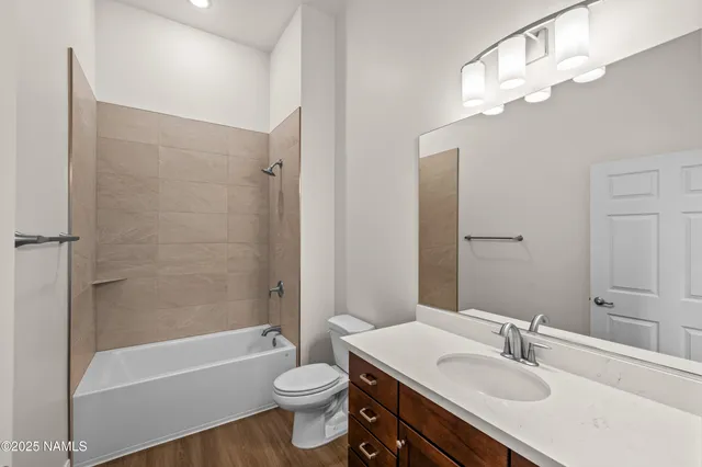 a black and white photo of a living room