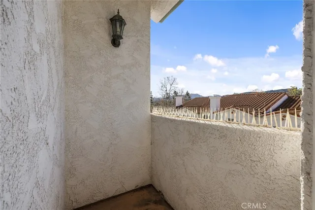 a bathroom with a double vanity sink and mirror with shower