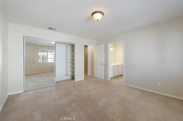 a bathroom with a sink a large mirror and a shower