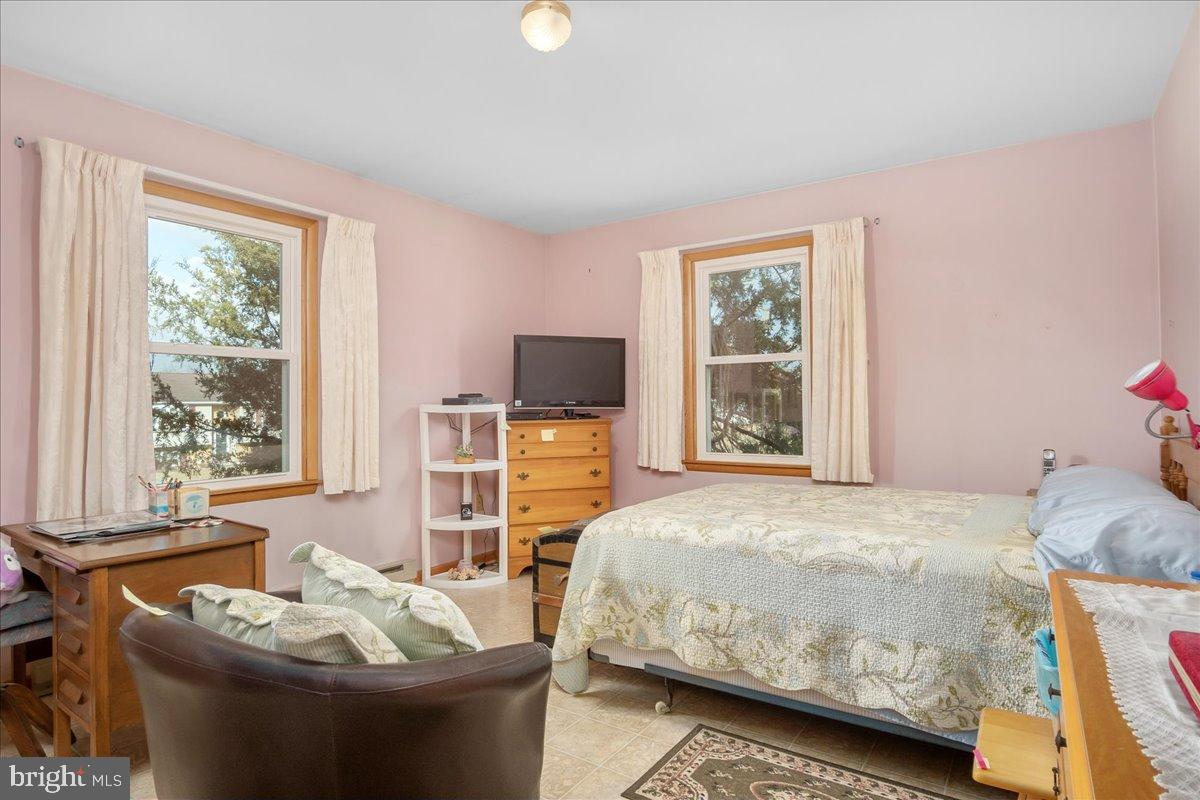 151 Tenderheart Lane Falling Waters, WV 25419 - Photo 14 of 55 Cozy retreat with soft pink hues.