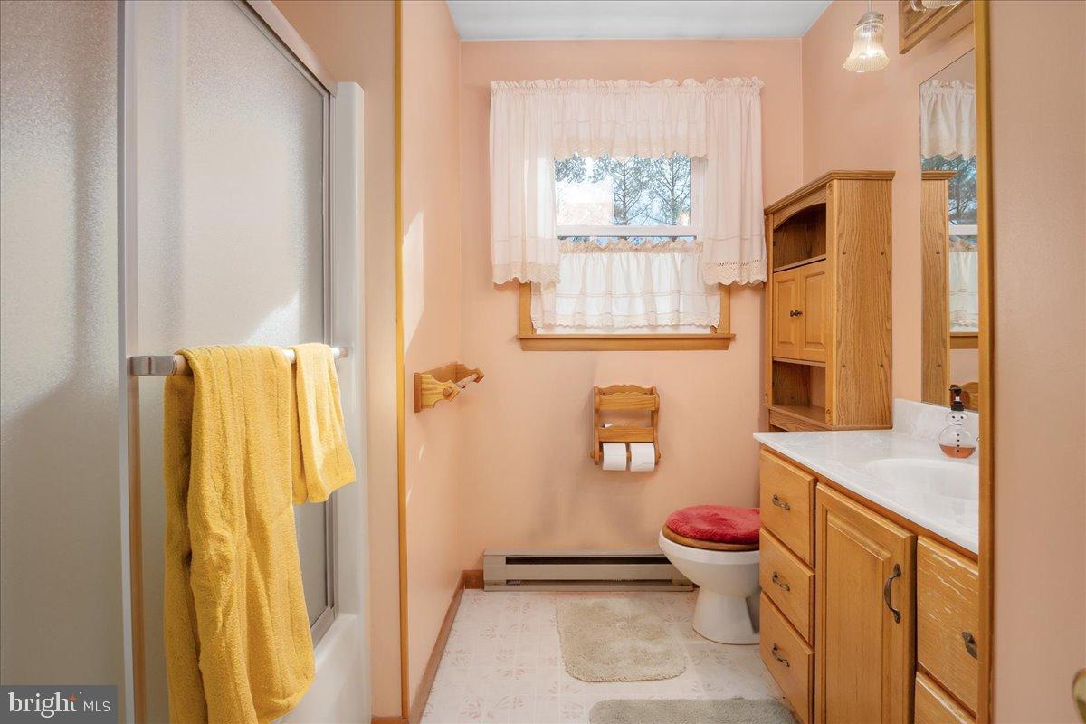 151 Tenderheart Lane Falling Waters, WV 25419 - Photo 18 of 55 Charming pastel bathroom with natural light.