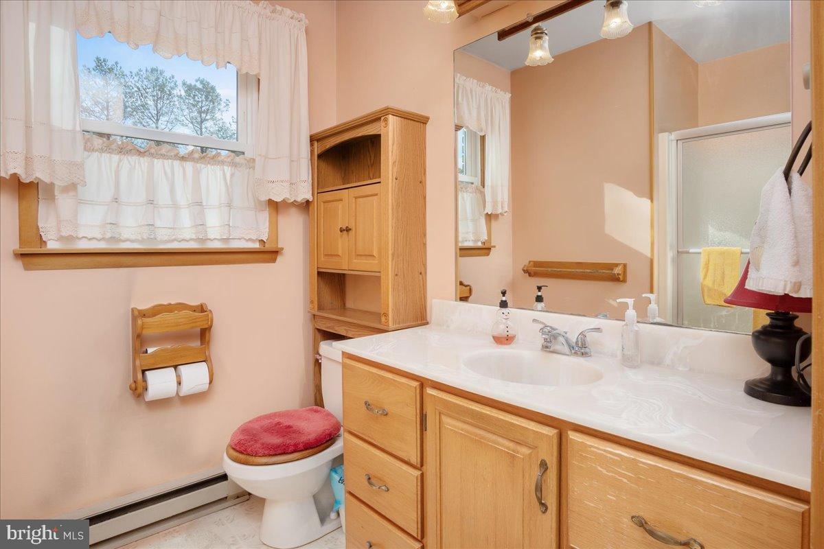 151 Tenderheart Lane Falling Waters, WV 25419 - Photo 19 of 55 Charming bathroom with warm, inviting tones.