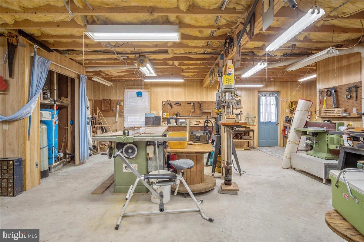 151 Tenderheart Lane Falling Waters, WV 25419 - Photo 23 of 55 Spacious workshop filled with tools and creativ...