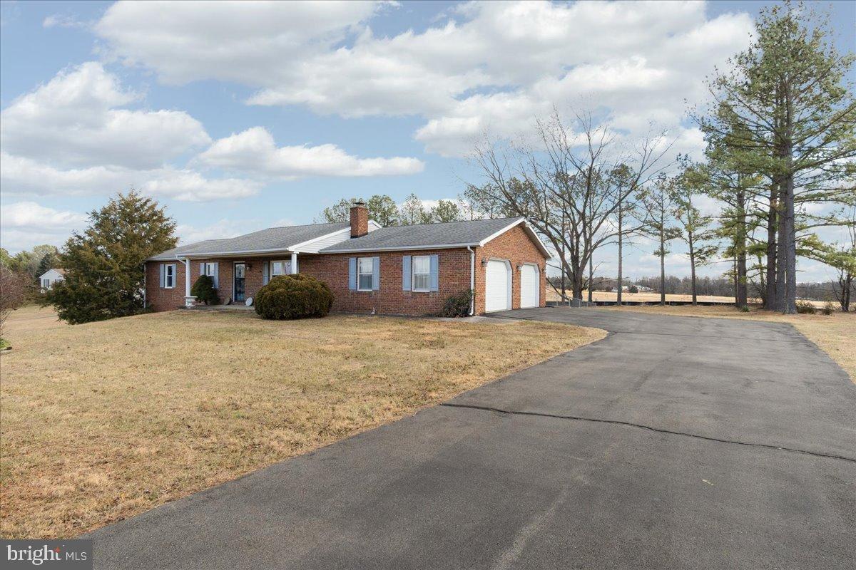 151 Tenderheart Lane Falling Waters, WV 25419 - Photo 4 of 55 Charming brick home on spacious grounds.