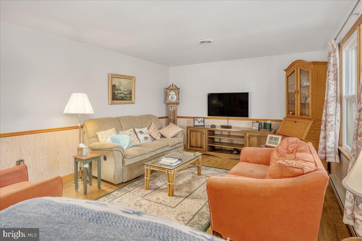 151 Tenderheart Lane Falling Waters, WV 25419 - Photo 7 of 55 Cozy living space with warm, inviting tones.