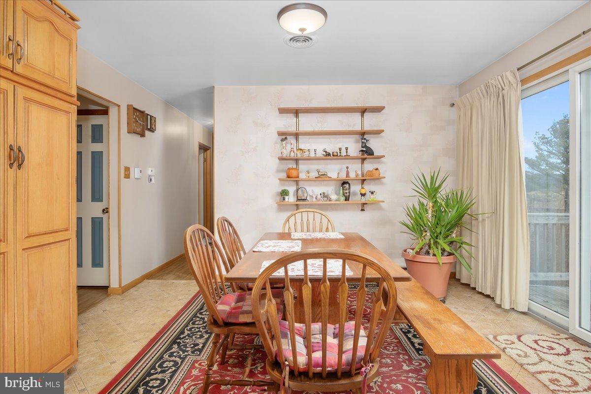 151 Tenderheart Lane Falling Waters, WV 25419 - Photo 10 of 55 Bright dining area with natural light.