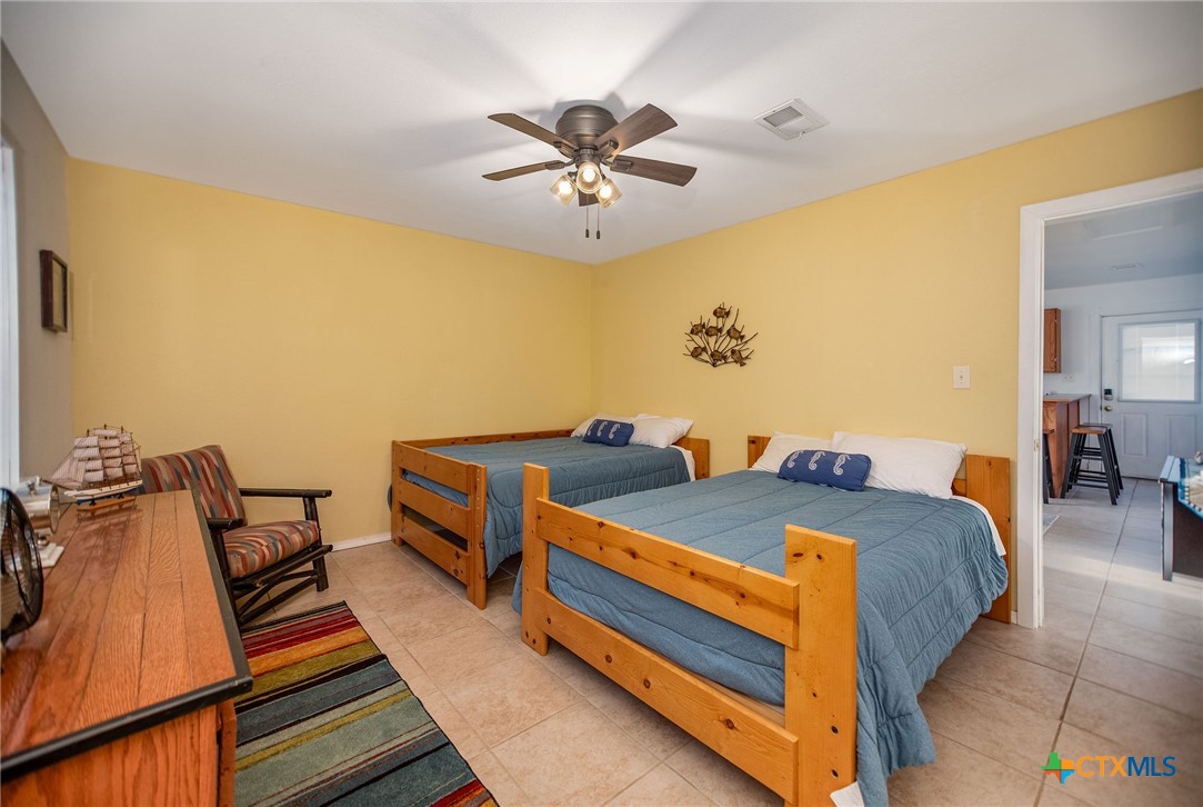 19 Dewberry Lane Seadrift, TX 77983 - Photo 29 of 40 Spacious bedroom with ample closet storage.